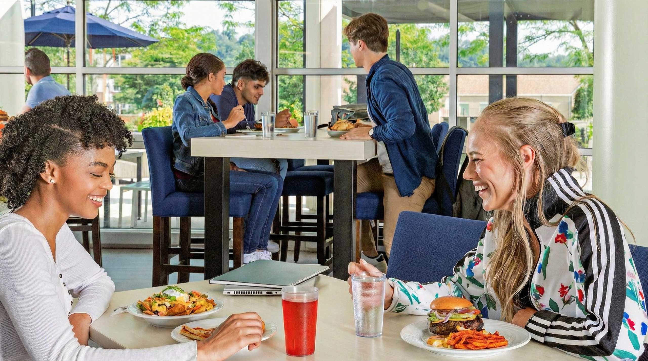 Two students enjoying a meal together
